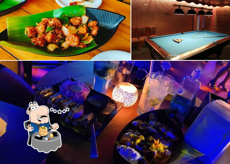 Check out the image showing food and interior at Nolimmits Lounge & Club