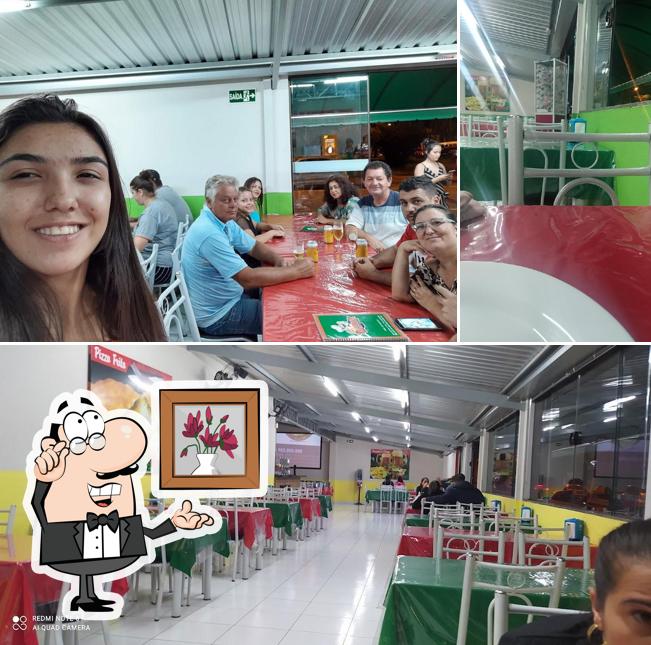 O interior do Tuty Pizzaria