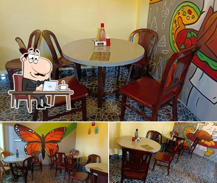 Take a seat at one of the tables at Unique resturent