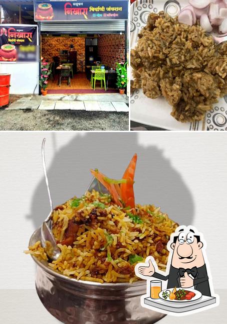 This is the image displaying food and interior at nikhara biryani junction