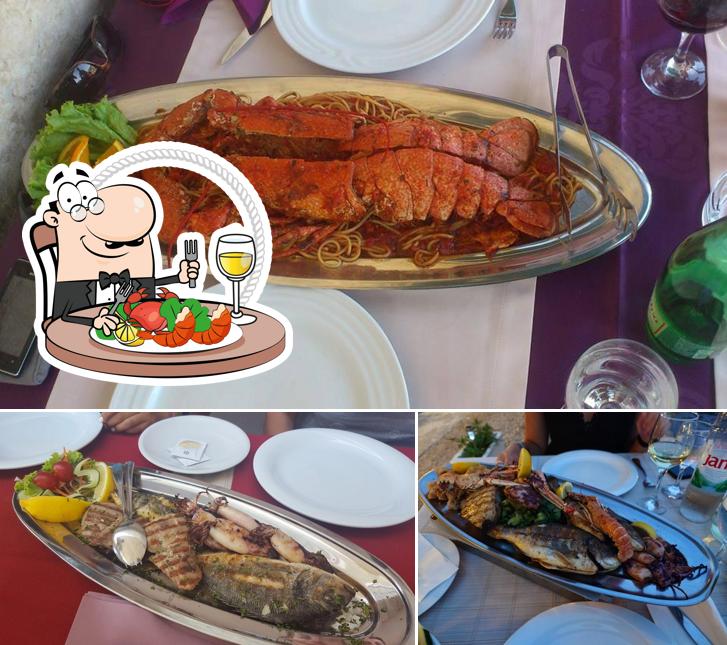 Prenditi tra i vari piatti di mare disponibili a Restoran-Pizzeria Arsenal