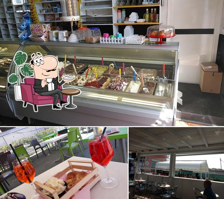 Questa è la immagine che presenta la interni e cibo di Bar Tabarè