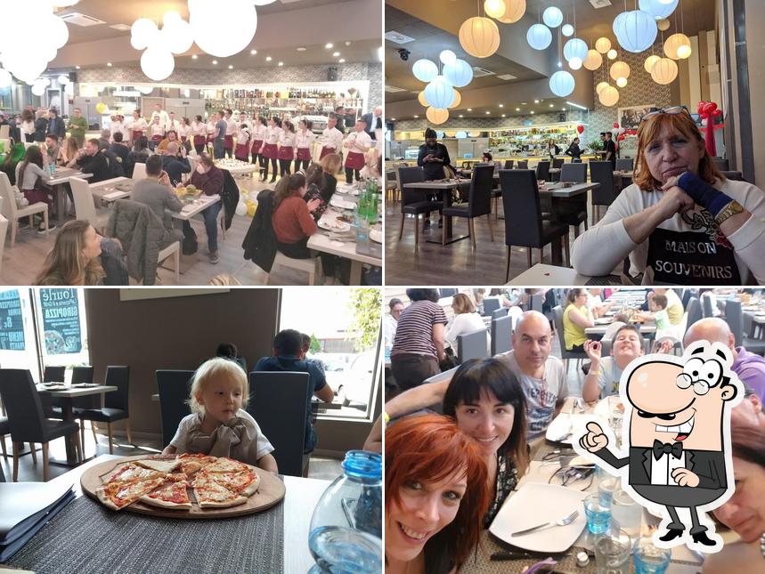 Siediti a un tavolo di Tourlé LaPizzeria e ilGrill Buccinasco