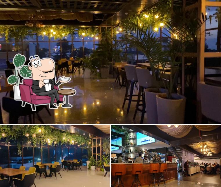 Take a seat at one of the tables at Bungalow Bar & Kitchen