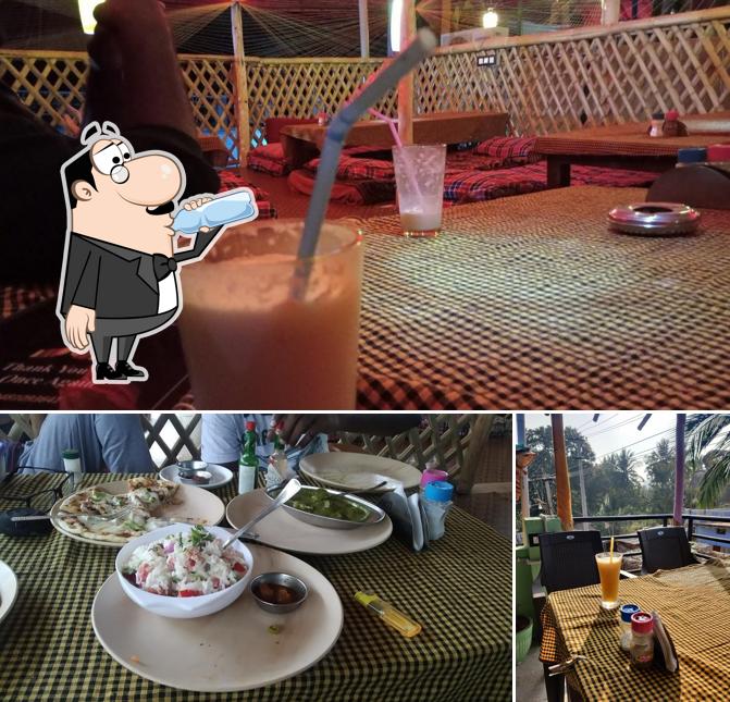 Among different things one can find drink and food at All Is Well (New Lakshmi Tourist Home)