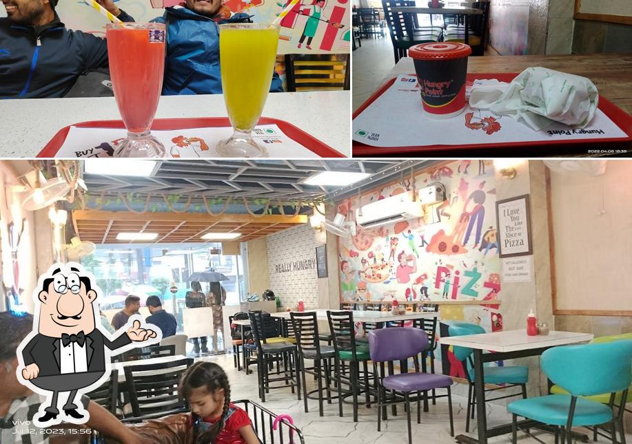 The photo of interior and food at Hungry Point - Srinagar UK