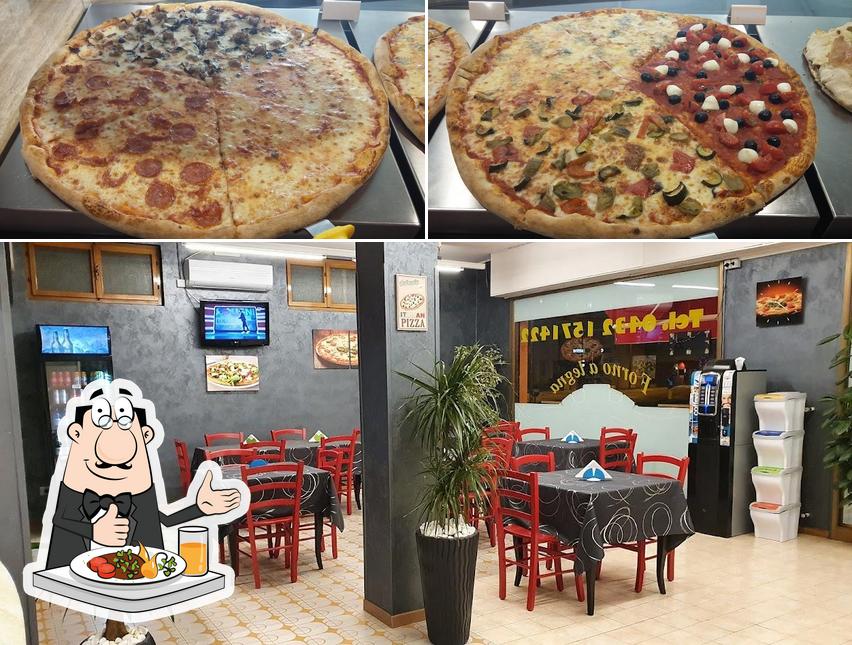 Tra le varie cose da Parco Pizza si possono trovare la cibo e interni