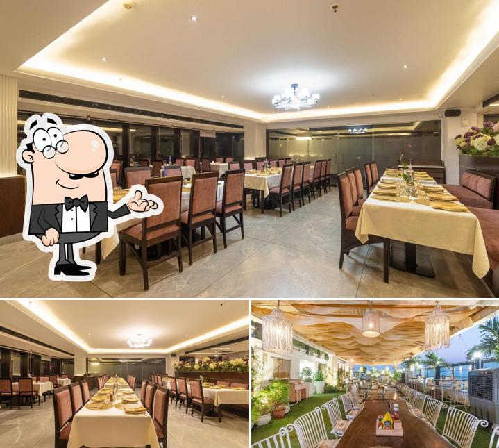 Take a seat at one of the tables at ZAZU