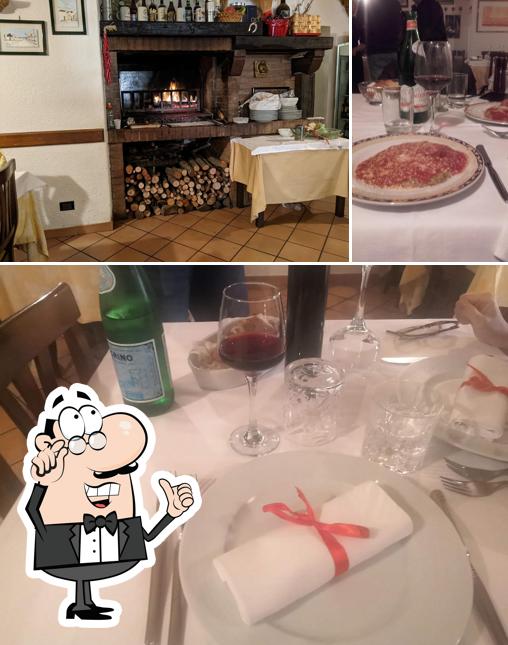 Ristorante Leon D'Oro si caratterizza per la interni e tavolo da pranzo