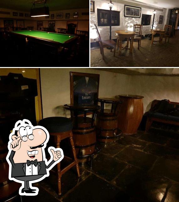 Take a seat at one of the tables at Attwood's Bar