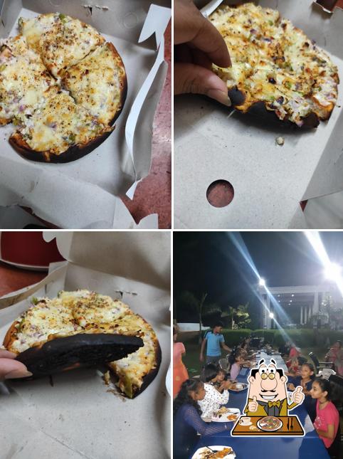 Try out pizza at Rajshree Restaurant