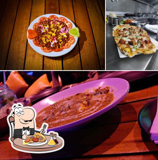 Get pizza at The 3 Musketeers Pub