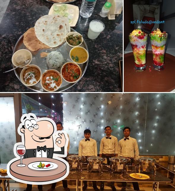 The photo of food and bar counter at HOTEL VEDANT VEG FOOD PLAZA