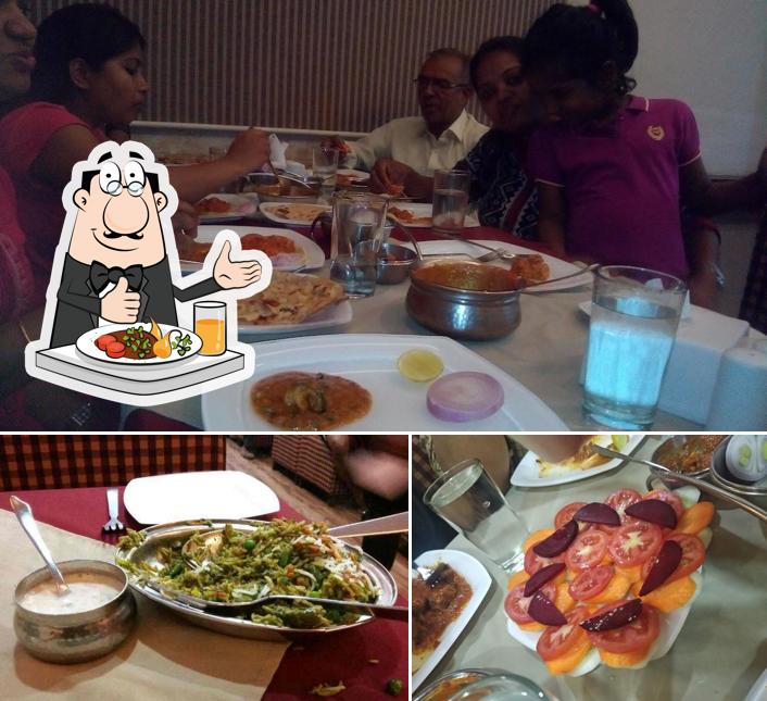 Check out the photo depicting food and dining table at Shiv Shanghai Restaurant