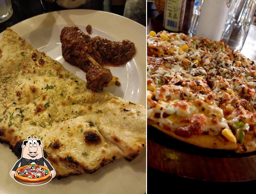 Pick pizza at Urban Chili Restaurant Best Restaurant in Ayodhya