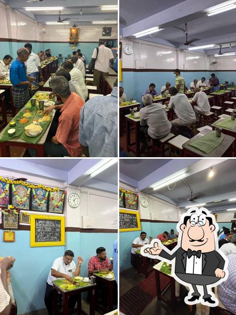 Take a seat at one of the tables at Kasi Vinayaga Mess