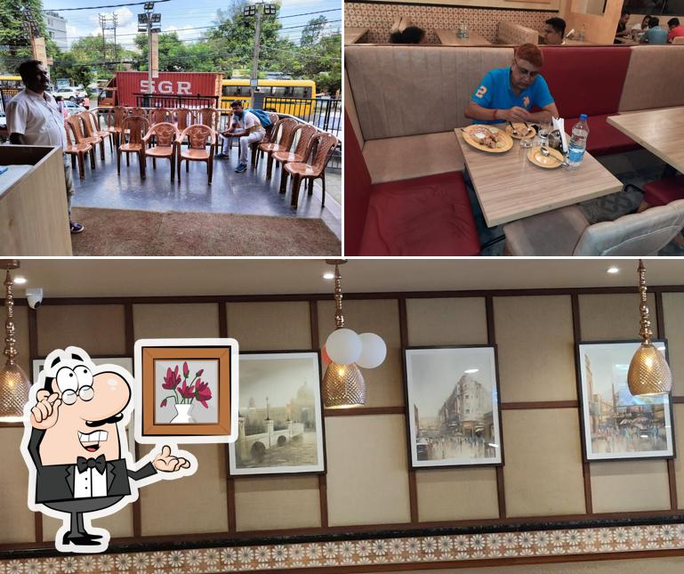 Take a seat at one of the tables at Aminia Restaurant