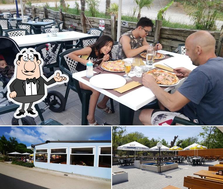 Siediti a un tavolo di Bar Ristorante Pizzeria- Klaus