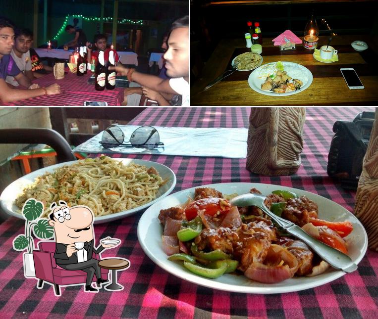 The photo of Caffe Italiano Varkala’s interior and food