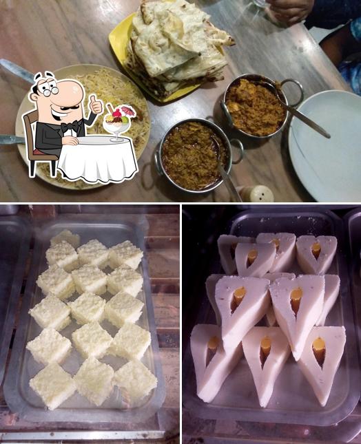 ADARSHA HINDU HOTEL serves a selection of desserts