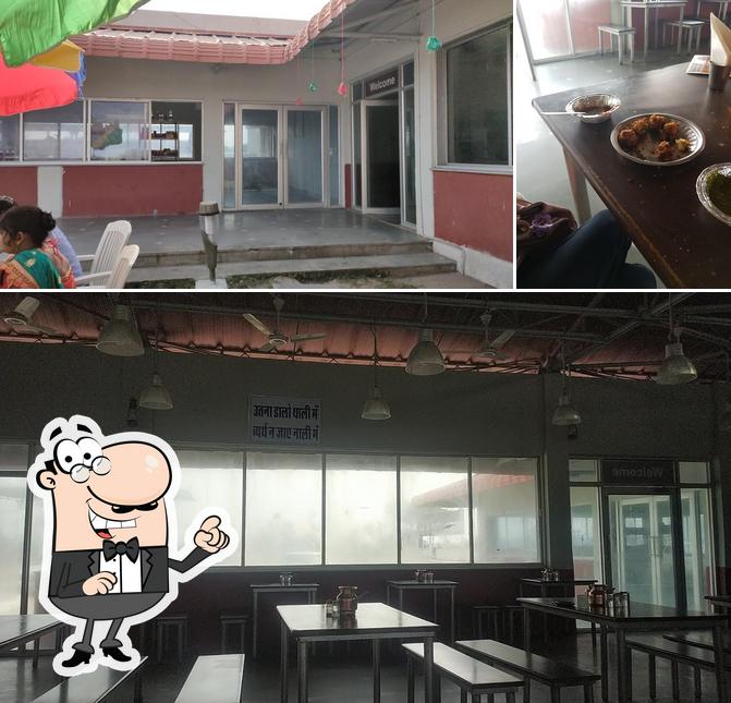 Take a look at the photo showing interior and food at Jodhpur food plaza