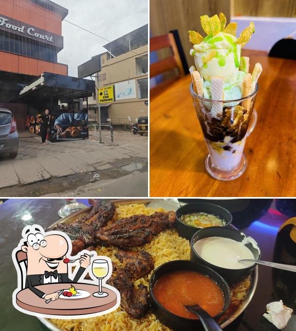 Among various things one can find food and exterior at TOP KITCHEN & BAKES