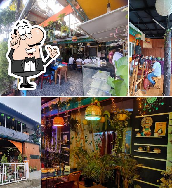 Check out how TUSKER CAF'E Restaurant Thekkady looks inside