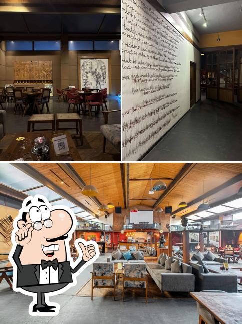 Take a seat at one of the tables at Pablo The Art Cafe Lounge