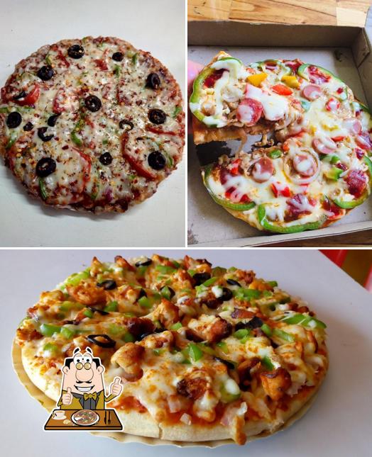 Get pizza at Ayaan's Angara Fried Chicken