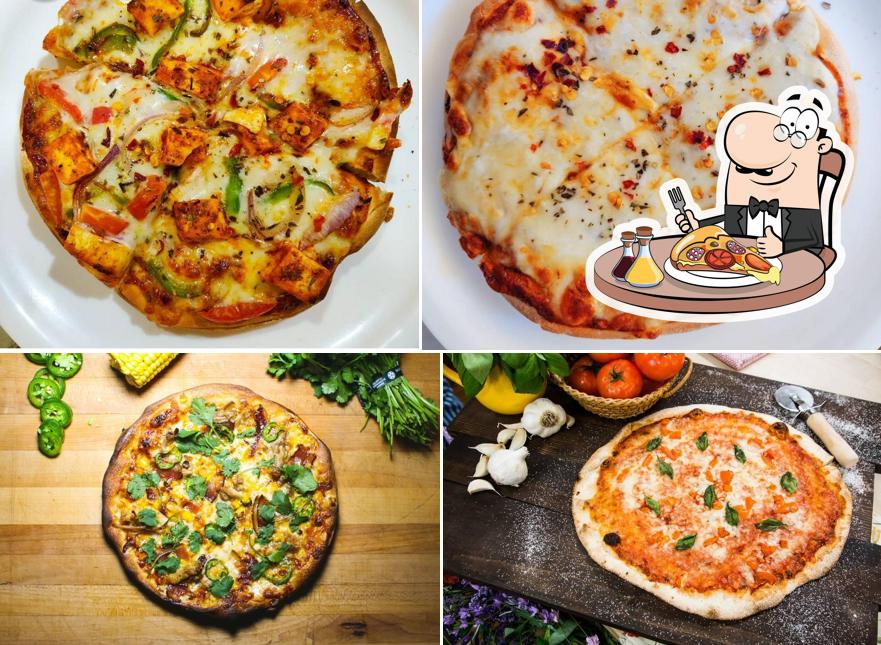 Get pizza at D WHITE CAFE