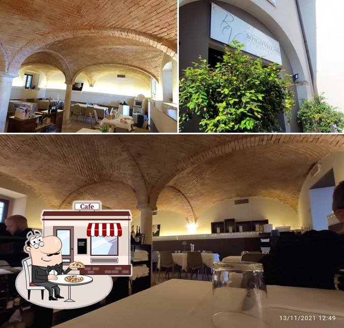 Tra le varie cose da Trattoria Borgo Vecchio si possono trovare la esterno e cibo