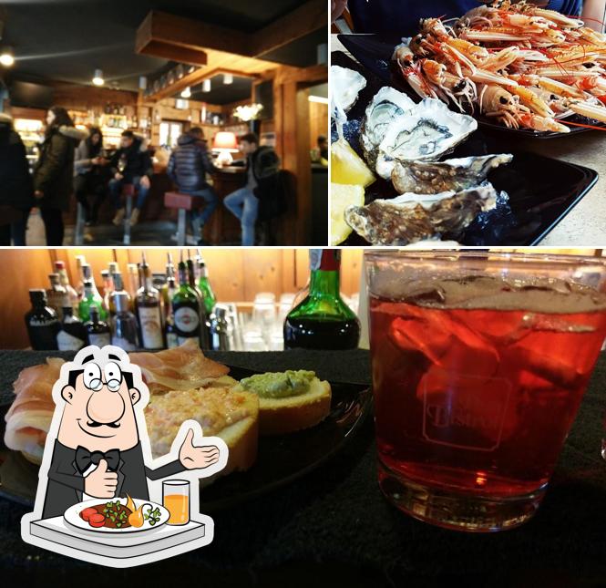 Tra le diverse cose da Le Petit Bistrot si possono trovare la cibo e bancone da bar