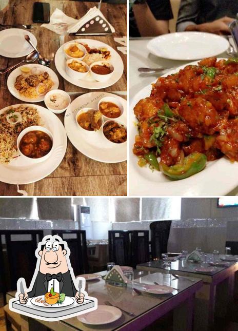 The photo of food and interior at Nawabz