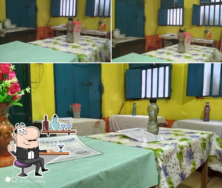 This is the photo depicting interior and beverage at Tasty point