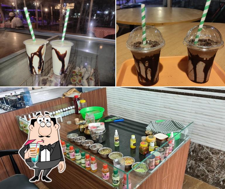 Among various things one can find drink and interior at Time Food Garden Restaurant Pure Vegetarian