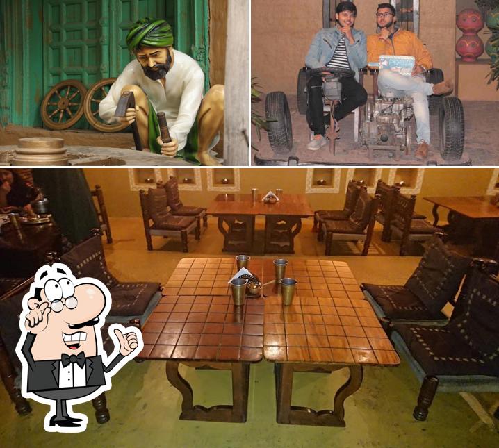 Take a seat at one of the tables at Rangla Punjab Take a seat at one of the tables at Rangla Punjab