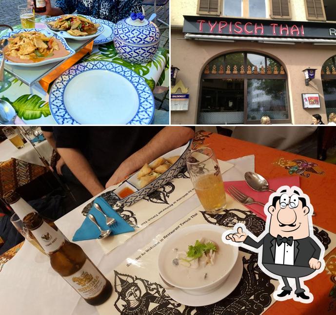 Guarda la immagine che mostra la interni e tavolo da pranzo di Restaurant Typisch Thai