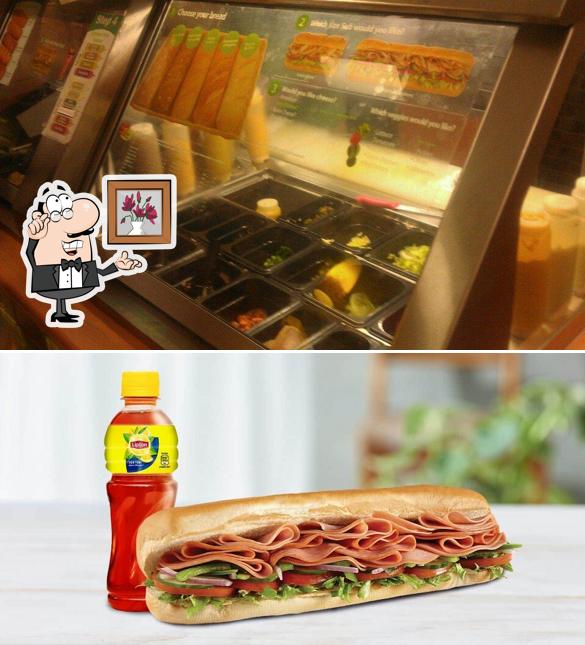 Take a seat at one of the tables at Subway
