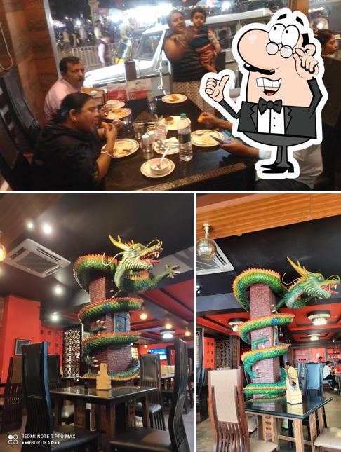 Take a seat at one of the tables at Seagull Thali Restaurant