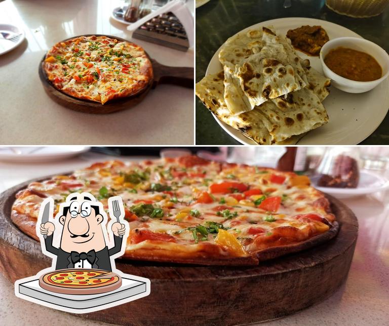 Try out pizza at Maahol Restaurant