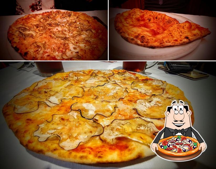 A Pizzeria Lo Scugnizzo, puoi prenderti una bella pizza