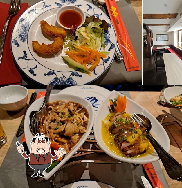 Tra le varie cose da Restaurant Kam Yu si possono trovare la cibo e interni