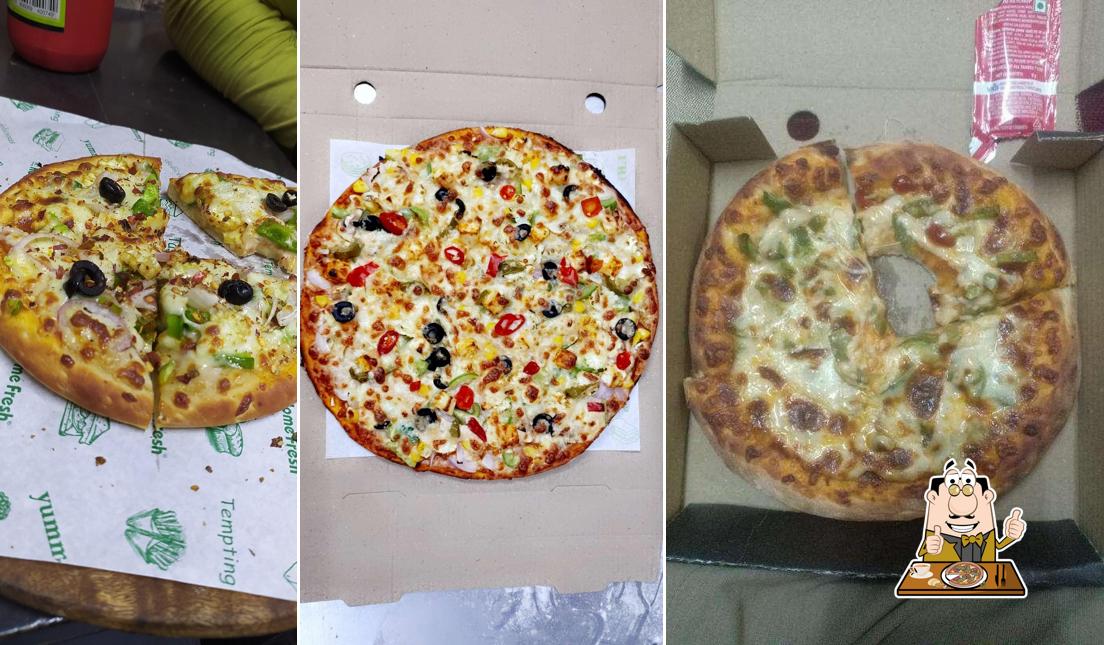 Get pizza at Uncle Singh Da Cafe