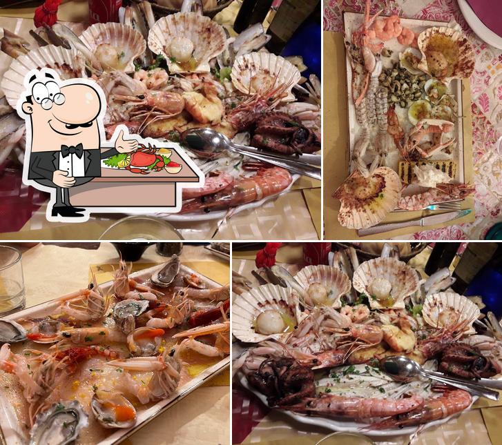 Goditi i sapori della cucina di mare a Hosteria Re Roverso