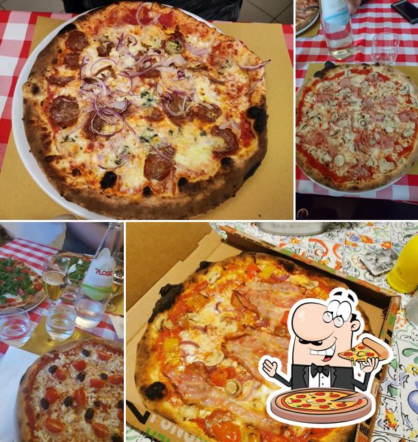 A Pizzeria Da Mario, puoi prenderti una bella pizza