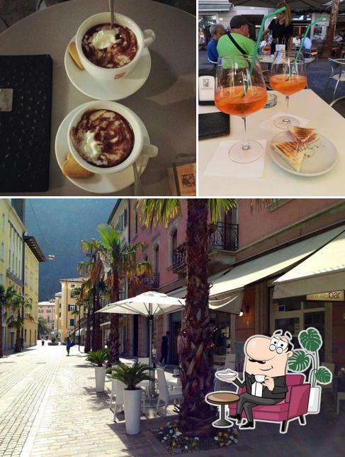 Questa è la foto che mostra la interni e tavolo da pranzo di Mini White Bar - Riva del Garda