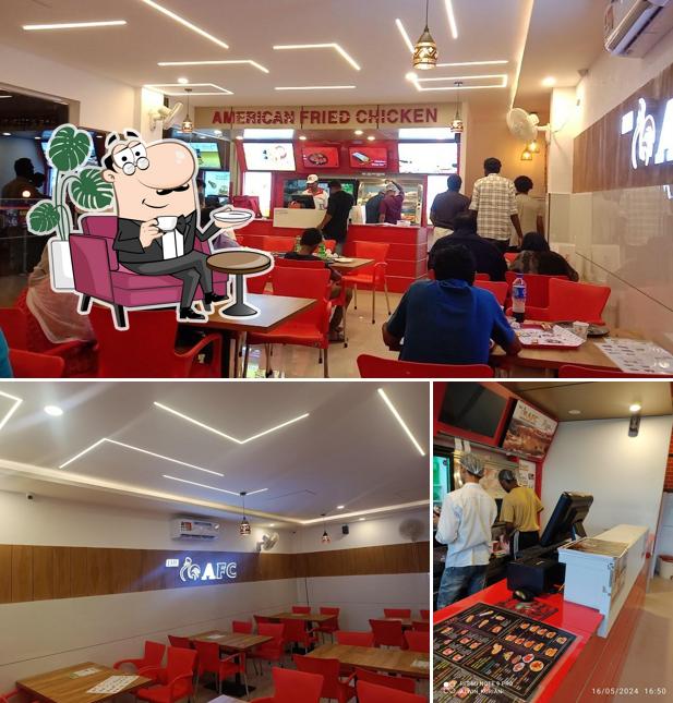 Take a seat at one of the tables at The AFC American Fried Chicken Punalur