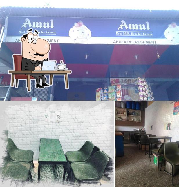 The photo of Ahuja Refreshment Center’s interior and exterior