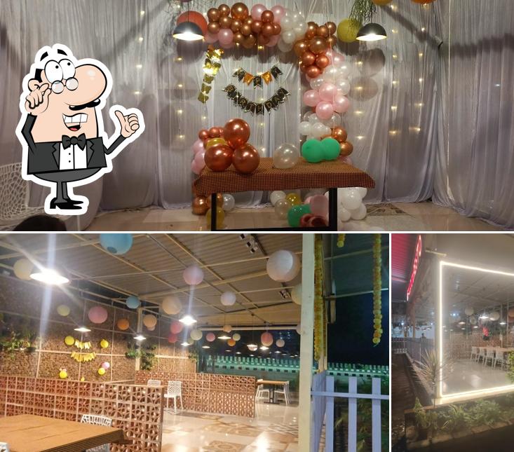 Take a seat at one of the tables at BALLOON RESTO