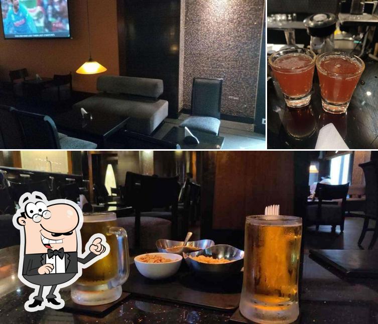 This is the image showing interior and beverage at Mustang Bar - Green Park Hotel
